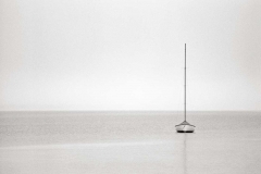 Solo boat on water.