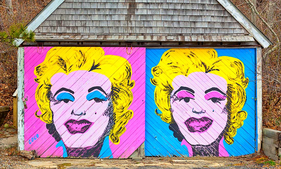 Marilyn Monroe painting on old garage doors.