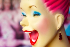 Smiling female mannequin in store on Commercial Street, Provincetown, Cape Cod.
