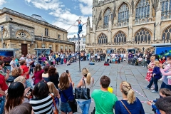 Street performer in front of the  Bath Abbey, Bath Spa, England.