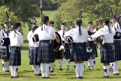 An Irish-American plays his bagpipes.