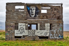 Graffiti artwork on abandoned building, Iceland.