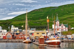 Fishing and tourist boats in Husavik, Iceland.